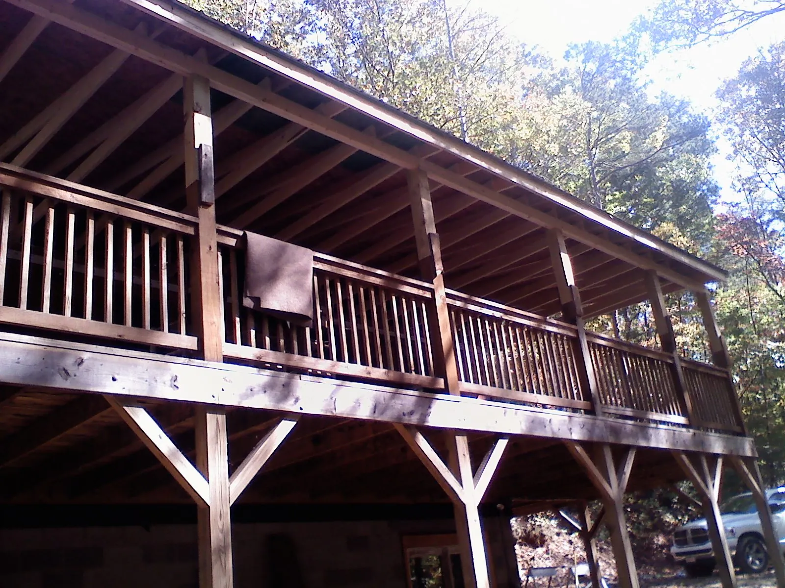 Timber framing under a new elevated porch and deck — Roof Leak Repair in Helena by Roofing Brothers
